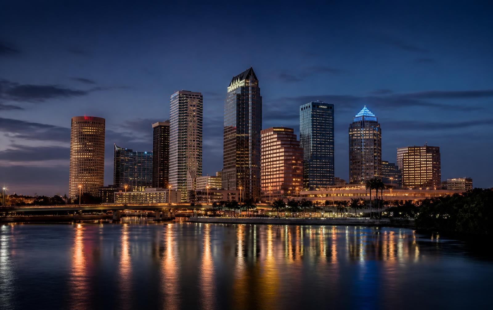 The Downtown Tampa, Florida skyline at dusk along the river waterfront